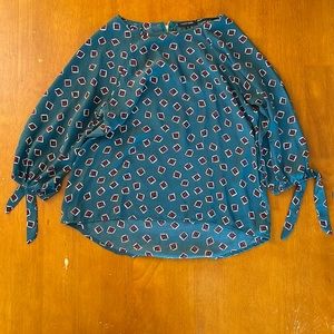 Paper Moon patterned blouse with ties at sleeves